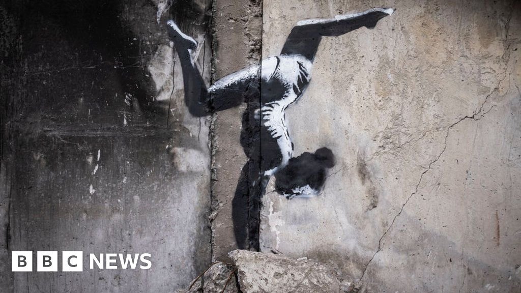 Banksy unveils Ukraine gymnast mural on building shelled by Russia