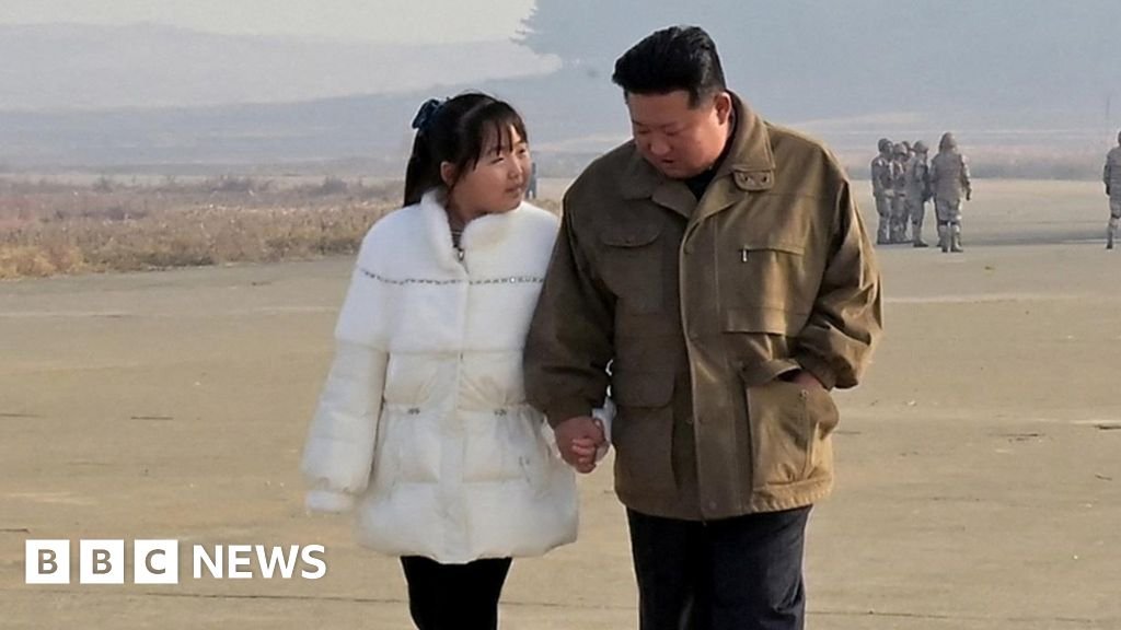 North Korea's leader Kim reveals his daughter in rare appearance