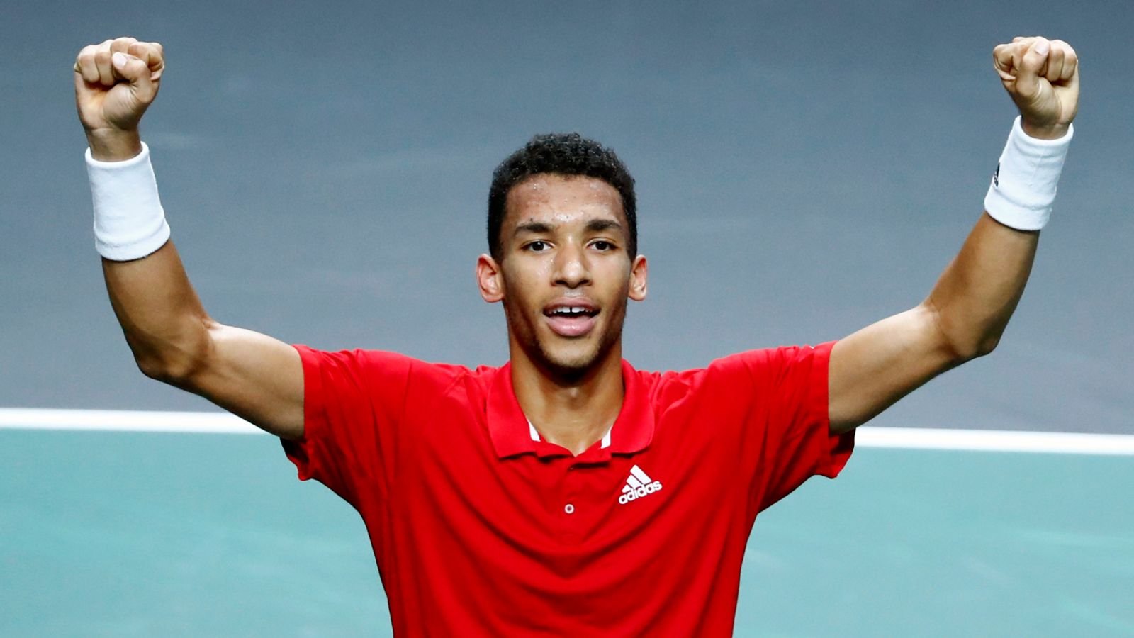 Canada's Felix Auger Aliassime celebrates after defeating Australia's Alex de Minaur  (AP Photo/Joan Monfort)