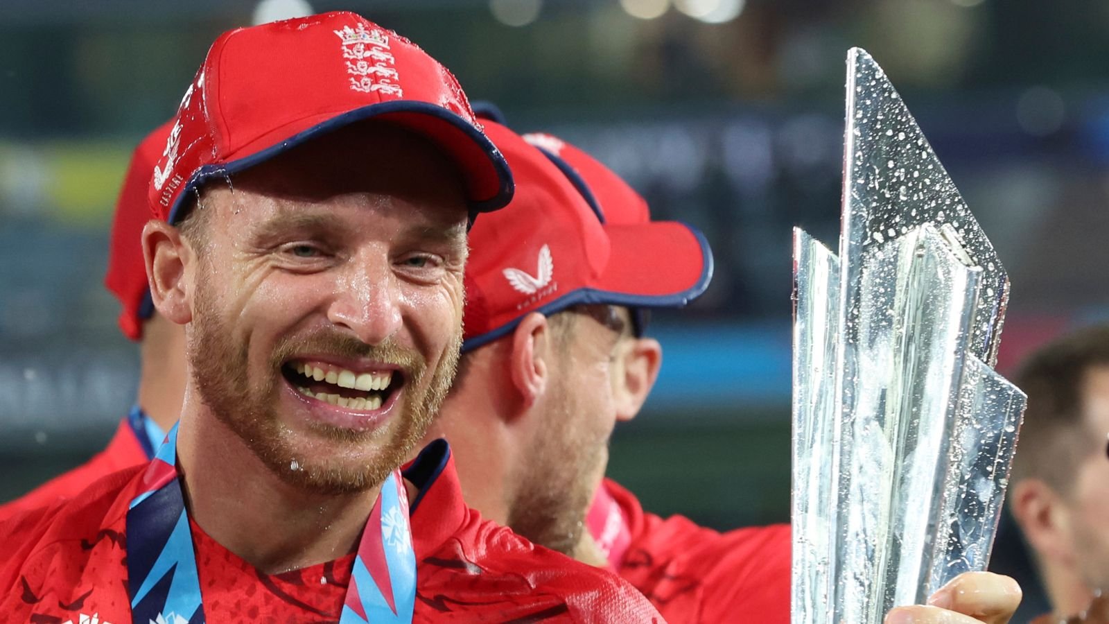 England's Jos Buttler, right, celebrates teammate Sam Curran after England defeated Pakistan in the final of the T20 World Cup Cricket tournament at the Melbourne Cricket Ground in Melbourne, Australia, Sunday, Nov. 13, 2022. (AP Photo/Asanka Brendon Ratnayake)