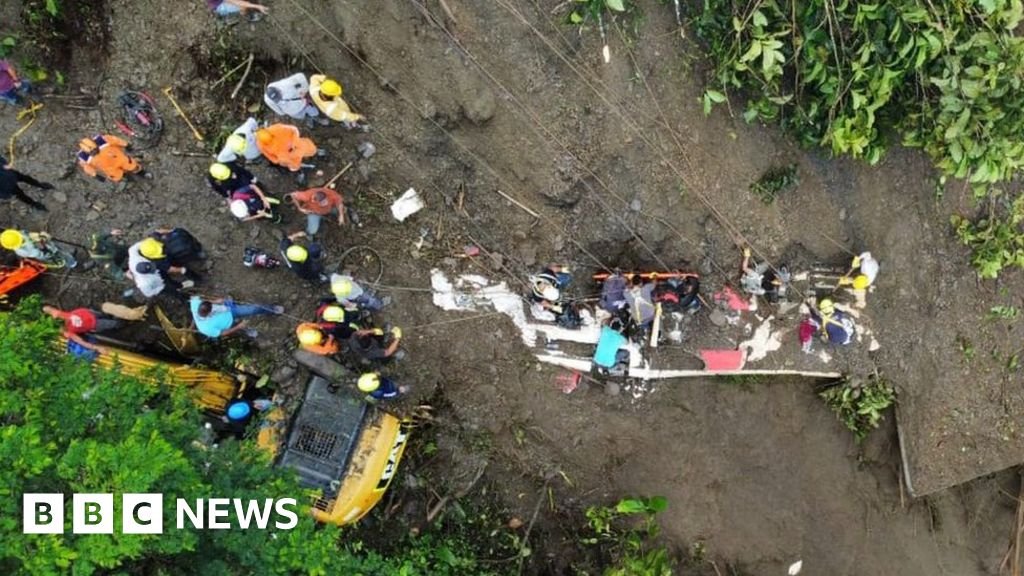 Colombia mudslide: Search for buried bus passengers