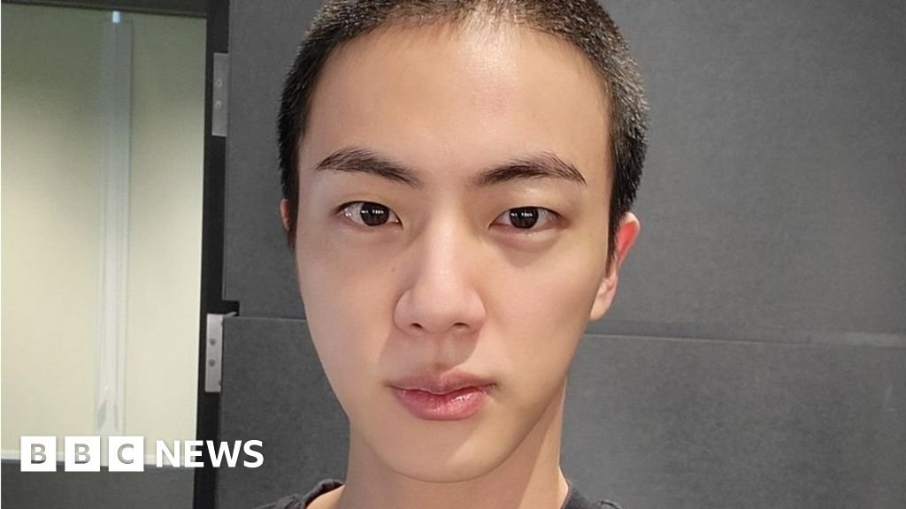 K-pop star Jin from BTS begins military service