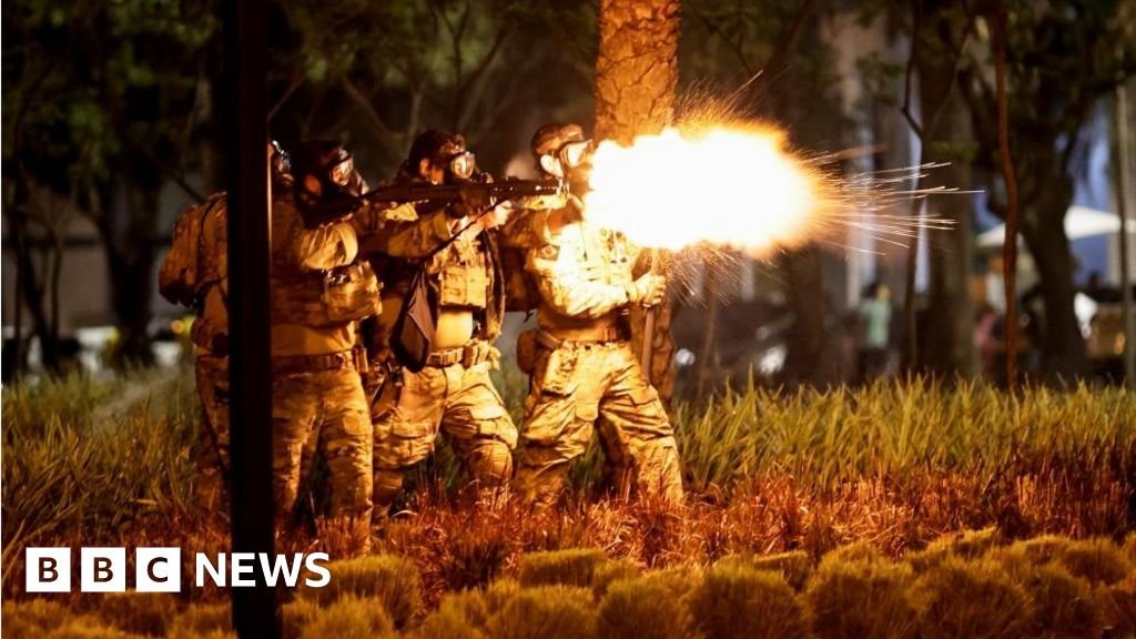 Brazil protests: Bolsonaro supporters attack police HQ