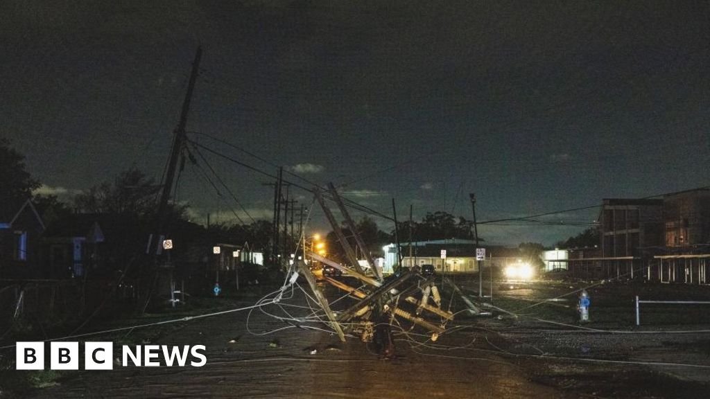 Power cuts in seven states as deadly winter storm and tornadoes hit US