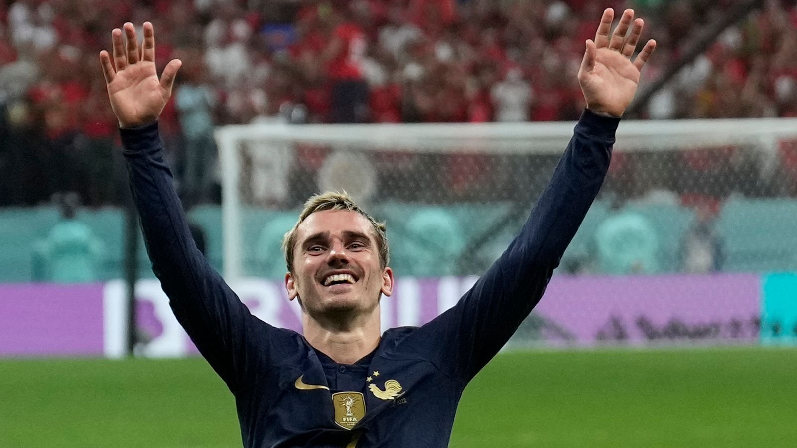 France's Antoine Griezmann celebrates after the World Cup semifinal soccer match between France and Morocco at the Al Bayt Stadium in Al Khor, Qatar, Wednesday, Dec. 14, 2022. (AP Photo/Francisco Seco)
