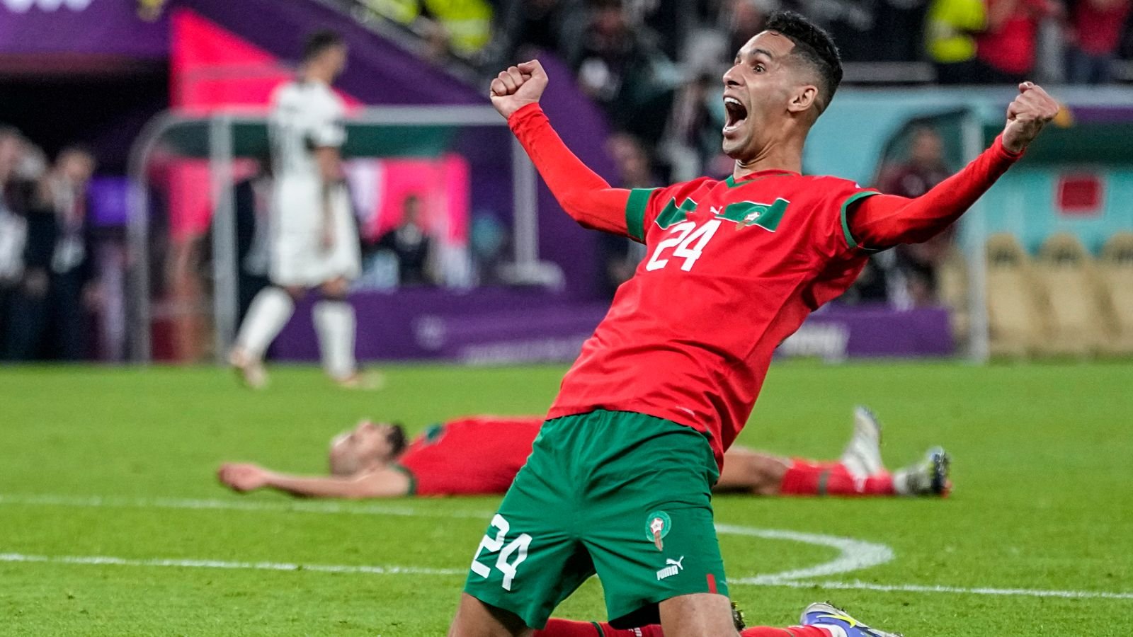 Badr Benoun celebrates after Morocco beat Portugal 1-0 to reach the World Cup semi finals