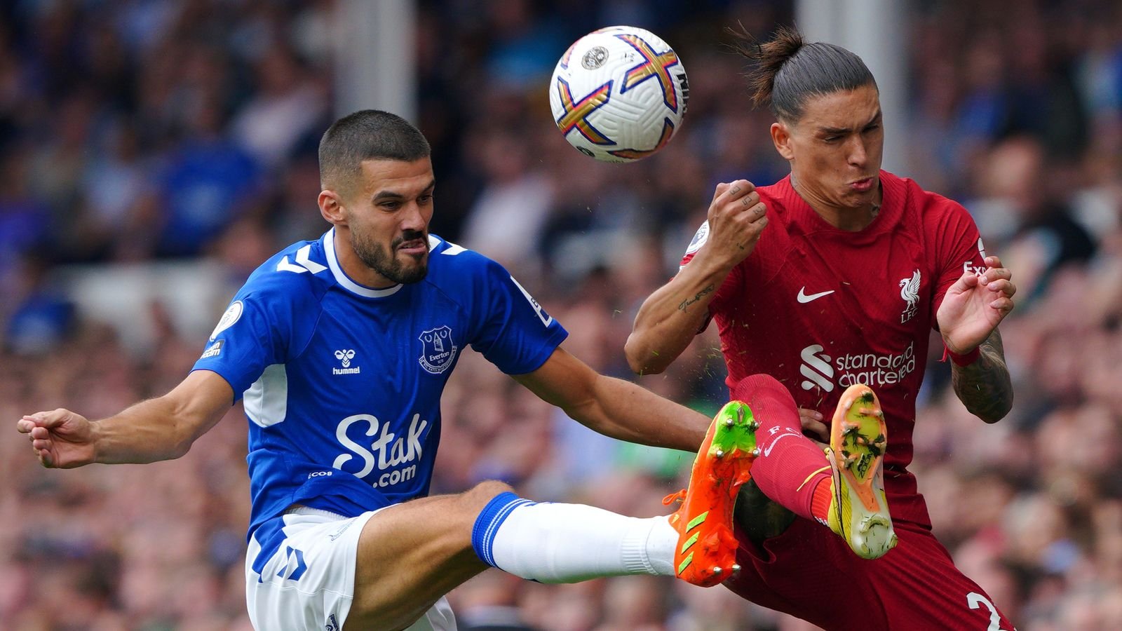 Everton's Conor Coady (left) and Liverpool's Darwin Nunez battle for the ball