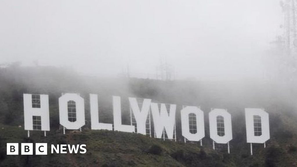 Rare snow dusts Hollywood sign as winter storm tightens grip