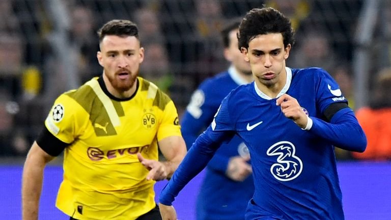 Salih Ozcan chases Joao Felix during Borussia Dortmund vs Chelsea