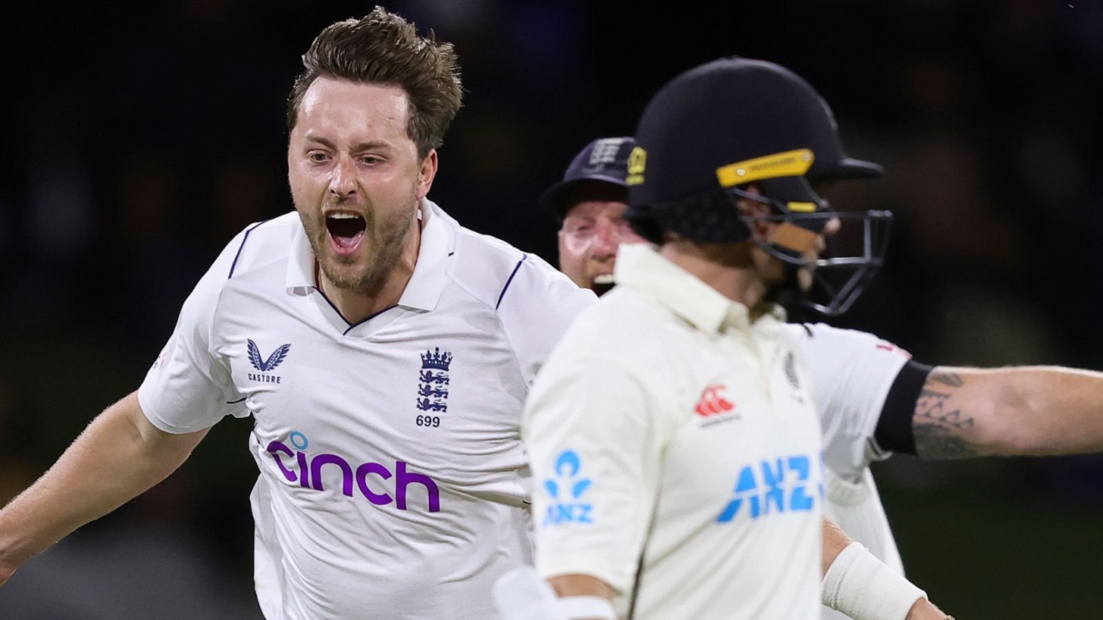 England's Ollie Robinson celebrates the wicket of New Zealand's Tom Latham at Bay Oval (Associated Press)