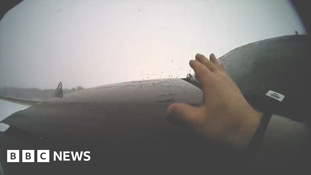 Body cam footage shows how car hit US police officer