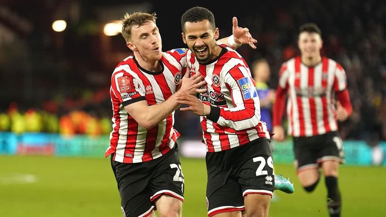 Sheffield United's Iliman Ndiaye (right) celebrates scoring their side's first goal of the game with team-mates during the Emirates FA Cup fifth round match at Bramall Lane, Sheffield. Picture date: Wednesday March 1, 2023.