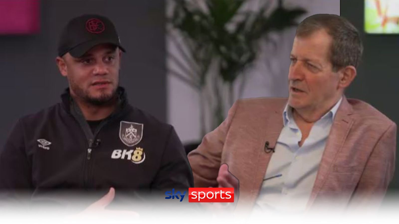 Alastair Campbell speaks to Burnley manager, Vincent Kompany.