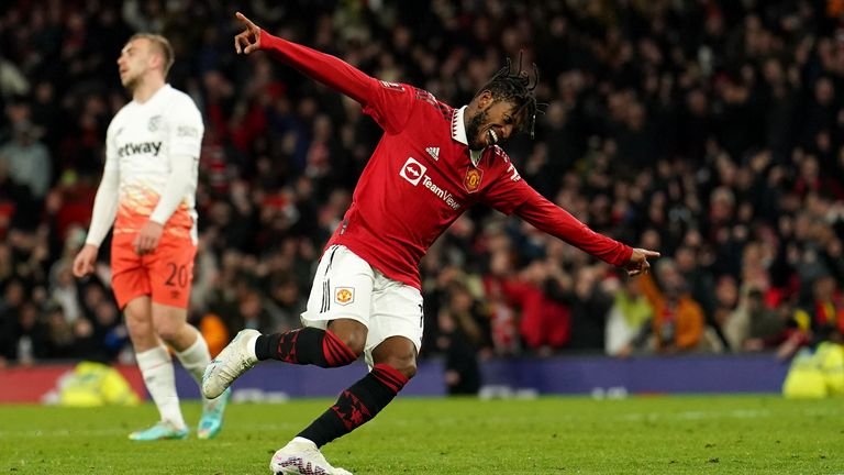 Fred celebrates after scoring Man Utd's third goal of the game