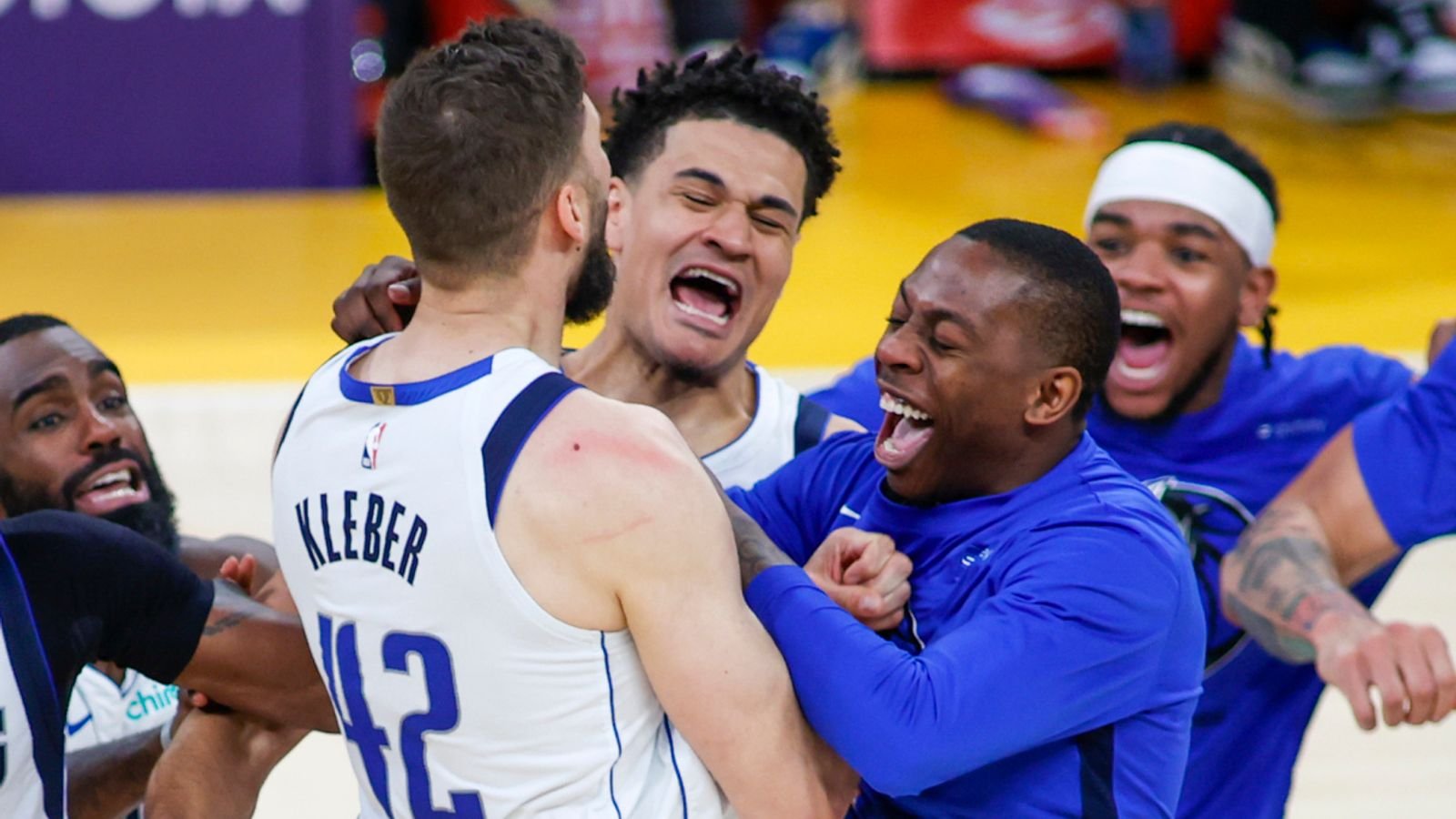 Dallas Mavericks players celebrate after forward Maxi Kleber makes a winning 3-pointer against the Los Angeles Lakers