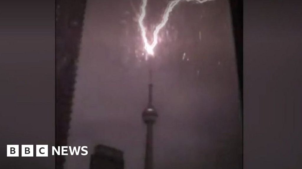 Lightning strikes the tip of Toronto's CN Tower